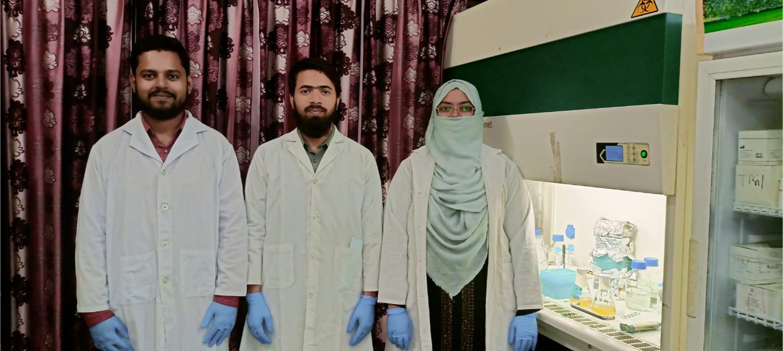 Team members in the lab