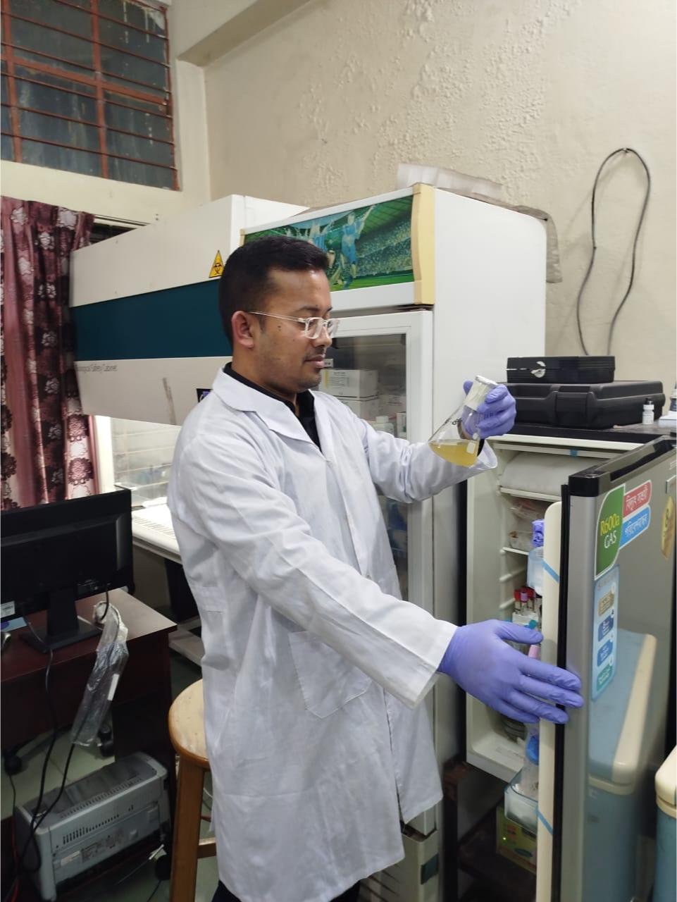 Retrieving a sample from the refrigerator